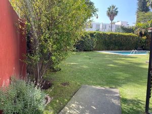 área común jardín con alberca y terraza