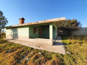 Construcción de 1 hectárea bardeada con 5 casas en obra. 