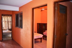 Casa con 12 cuartos, casa de huéspedes, en Sector U2 en venta Huatulco, Oaxaca.