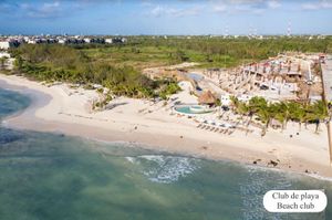 Terreno residencial en comunidad de lujo con club de playa, campo de golf, casa