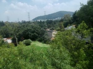 Terreno en zona boscosa y privada, dentro  de un condominio seguro y elegante.