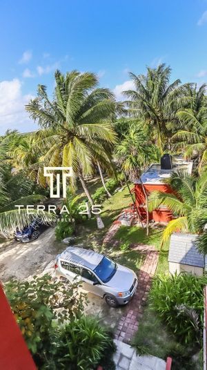 ESPECTACULAR CASA A PIE DE PLAYA EN PUERTO MORELOS A LA VENTA A PRECIO DE TERREN