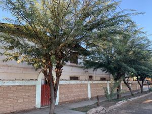 TERRENO EN VENTA CON CONSTRUCCION.  GUADALUPE VICTORIA, MEXICALI, BC