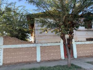 TERRENO EN VENTA CON CONSTRUCCION.  GUADALUPE VICTORIA, MEXICALI, BC