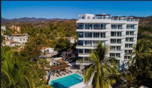 hermoso edificio a solo unos pasos de la playa