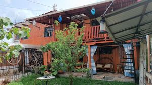 Casa con terreno y locales comerciales en el centro de San Cristóbal